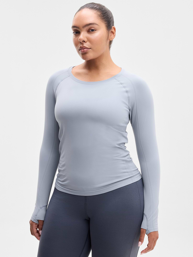 Image 1 of 7, FOR: Medium to high-impact workouts at the gym, studio, or outdoors, FEEL: Enhanced yarns deliver soft stretch and quick recovery, keeping you comfortable while you push your limits, FAVE: The workout top you love, now with upgraded stretch, sweat-wicking power, and sleek style, Seamless construction for minimal chafing, Functional mesh panels allow for optimal movement and breathability, Thumbholes lock your fit in place, Grippers at inner hem prevent it riding up, Product #845688