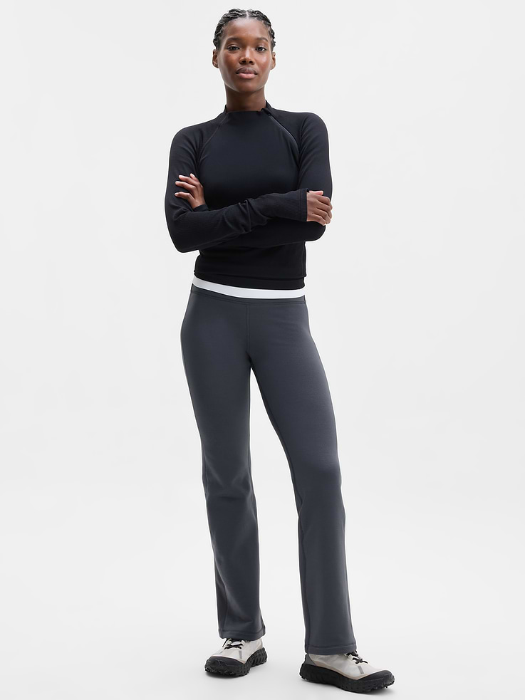 Image 1 of 7, FOR: Training in cold weather climates, FEEL: Polar Fleece fabric is soft and cozy with stretch, FAVE: Zip pockets secure your essentials, Product #1182498