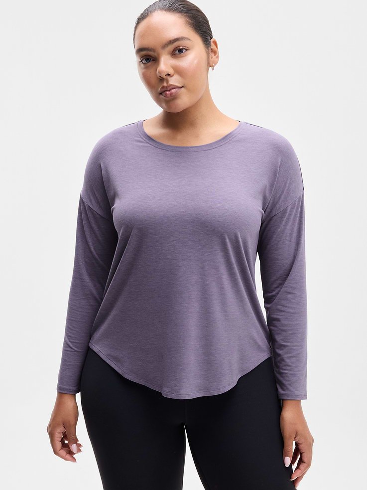 Image 1 of 6, FOR: Yoga or studio practice, FEEL: Soft, premium-weight comfort with luxurious TENCEL™ fibers that drape beautifully, FAVE: Your favorite studio top, modernized for more ease. Same premium-weight fabric, now with added front coverage and a minimal, clean back seam., Product #784678