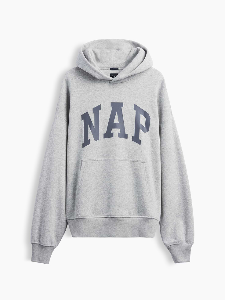 Image 1 of 3, Our softer than soft sweats. Brushed on the inside. Smooth on the outside. Made so that no two are alike., Soft cotton-blend fleece pullover hoodie. In an oversized fit., Hooded neckline.Long sleeves with drop shoulders., NAP arch logo at front., Kanga pocket., Banded cuffs & hem., Made with 23% recycled polyester. Compared to virgin materials, using recycled materials helps reduce resource use and waste., Explore our GapSweats Guide ., This product was made in a factory that invests in gender equity and women’s empowerment through RISE. Learn more at gapinc.com/equity ., Product #898155