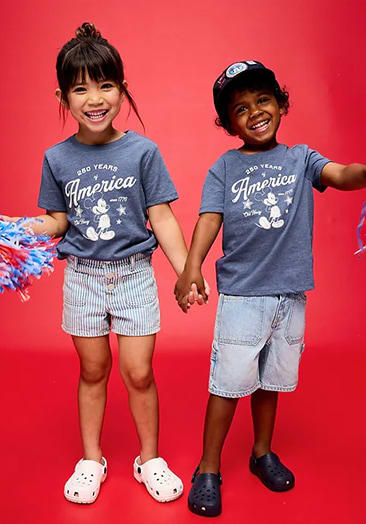 Image of two young models wearing the Old Navy x Disney collection.
