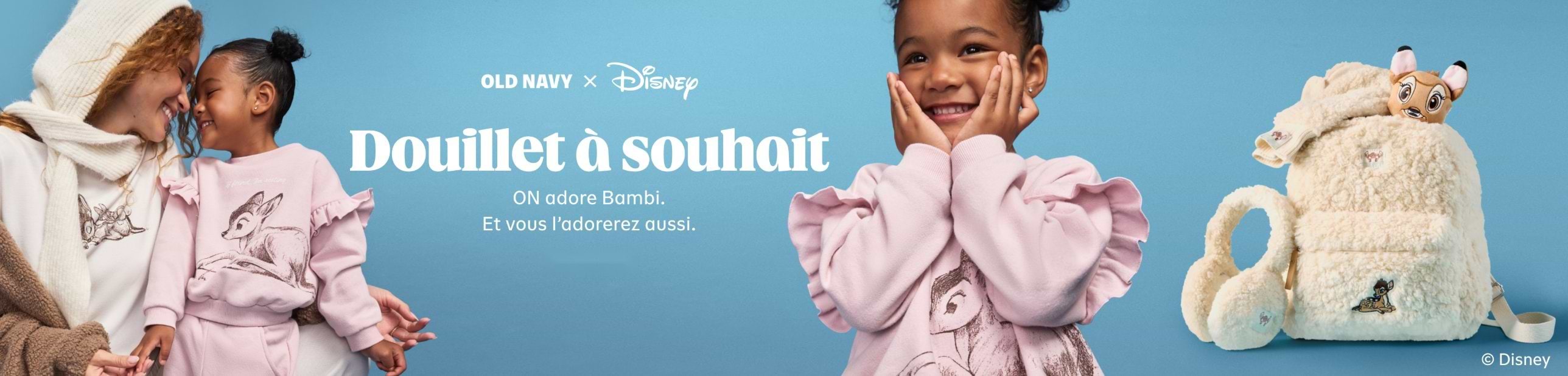 Old Navy x Disney ad showing a smiling child and adult in pink Bambi-themed sweatshirts against a blue background, with a fluffy cream Bambi backpack and earmuffs; headline reads “Cozy Ever After.”