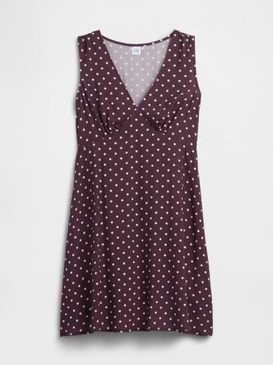 Sleeveless maroon A-line dress with white polka dots and a V-neck.