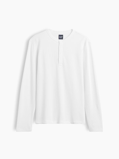 a white shirt with long sleeves and a collar