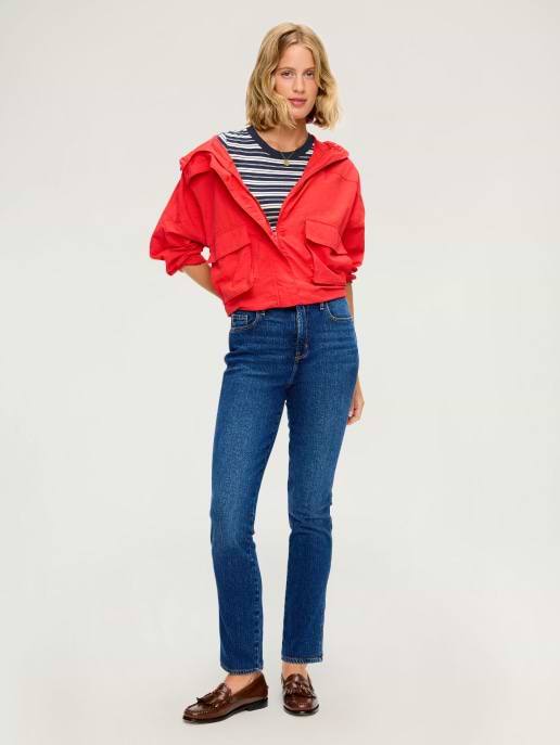 A dark wash ankle length skinny jean.