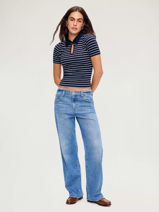 A loose fit straight leg jean paired with a striped crop tee.