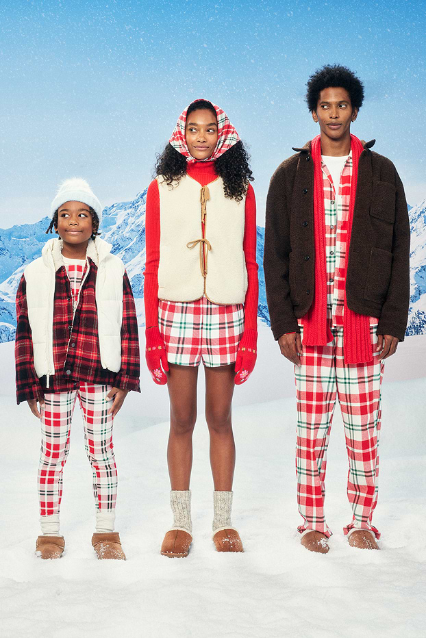 Image displays a family wearing matching pajamas.