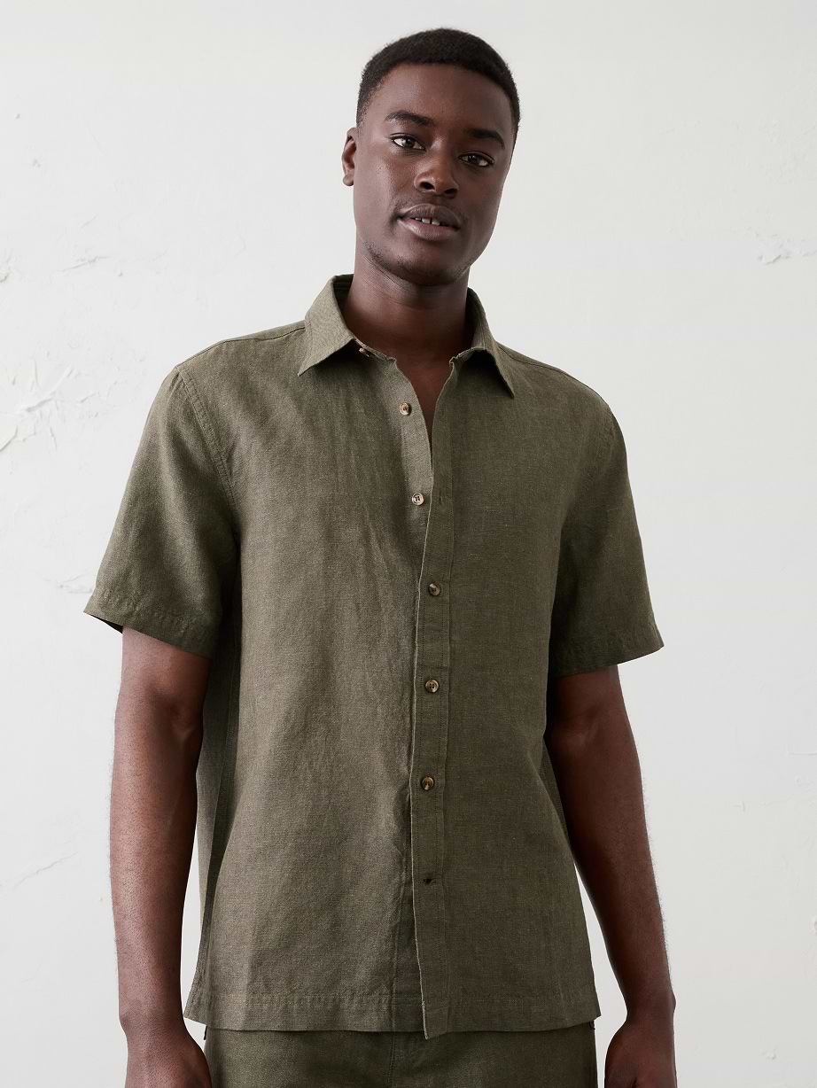 Man in green linen shirt.