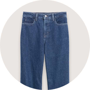 Front view of classic blue denim jeans with five-pocket styling.