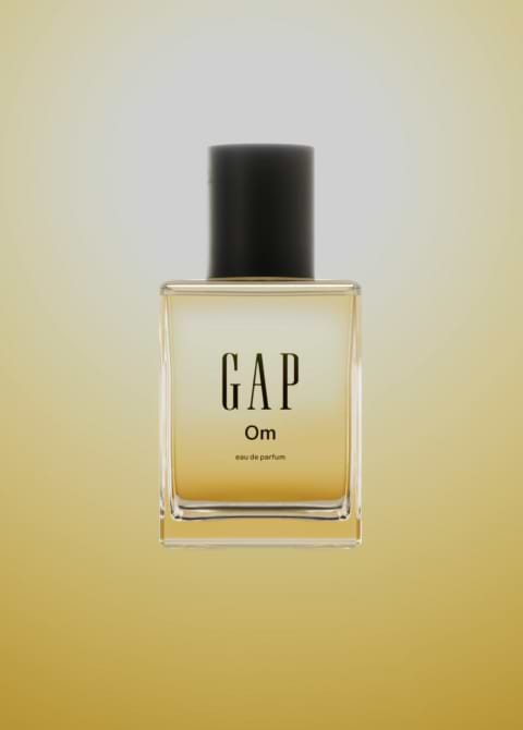 a bottle of gap cologne on a yellow background