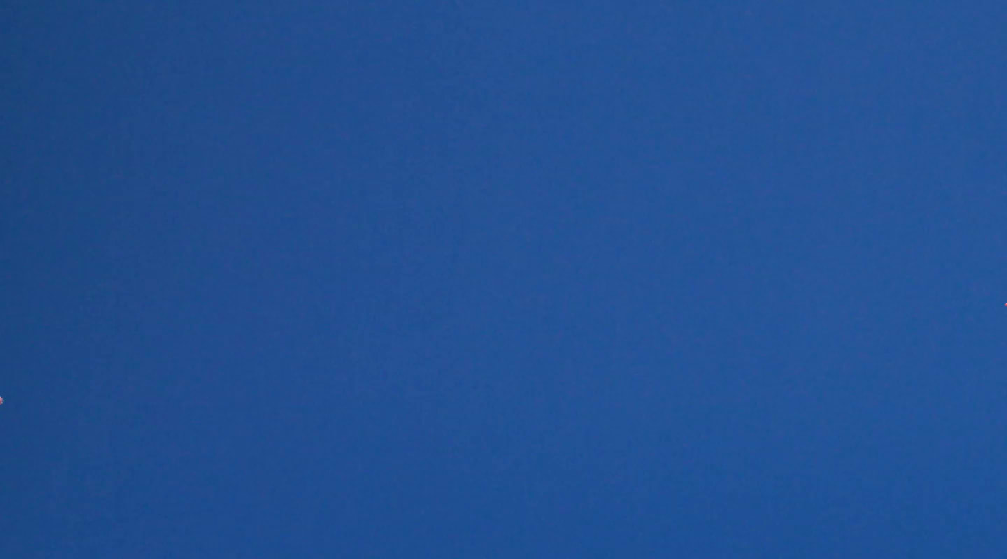 Clear, cloudless blue sky.