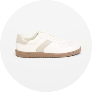 Image of tan and white leather sneakers.