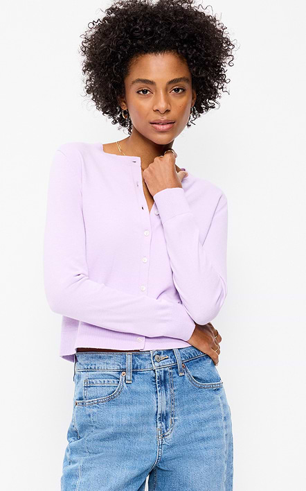 A female model wearing a light purple cardigan.