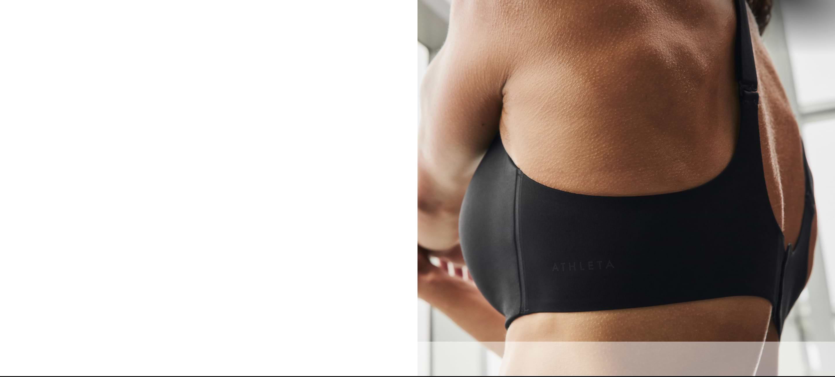 Woman wearing a black sports bra.