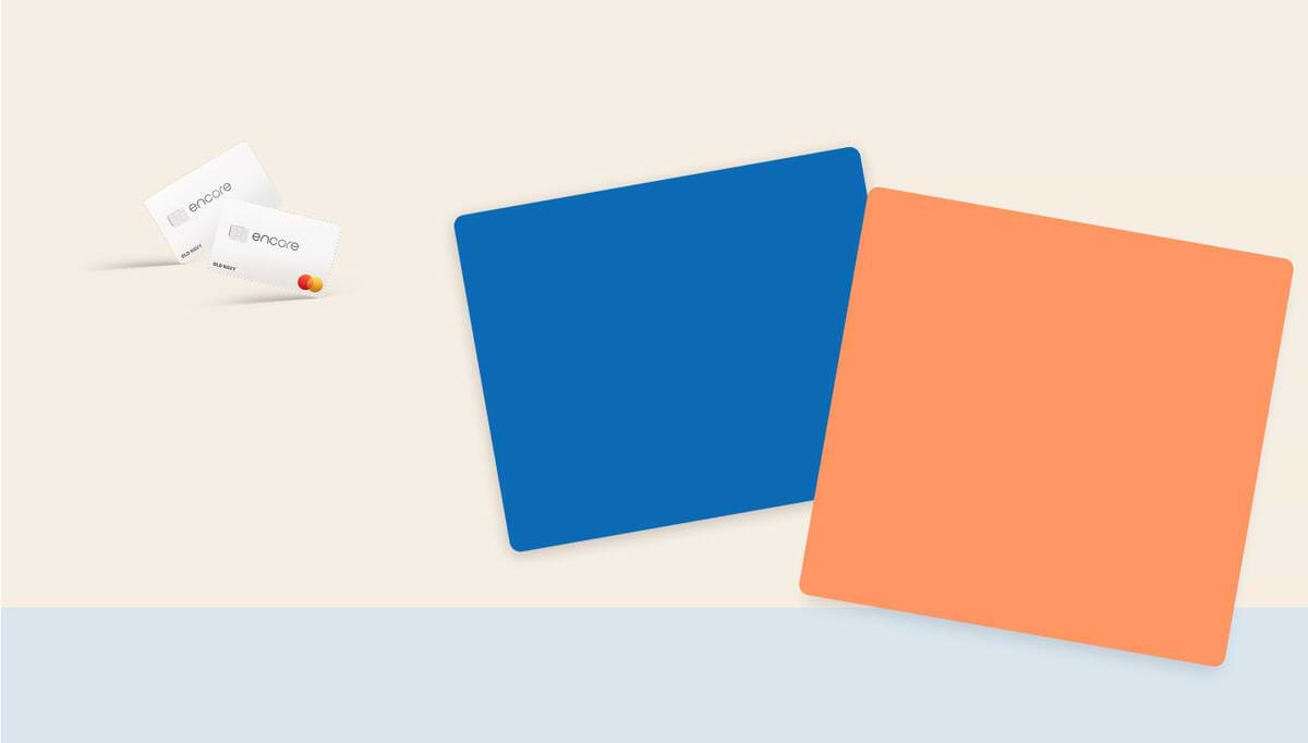 a pair of white encore credit cards featuring a mastercard logo of two orange circles overlapping