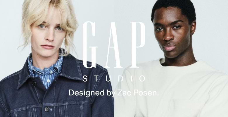 Two models in a denim jacket and a cream sweatshirt with overlaid text: “GAP Studio — Designed by Zac Posen.”
