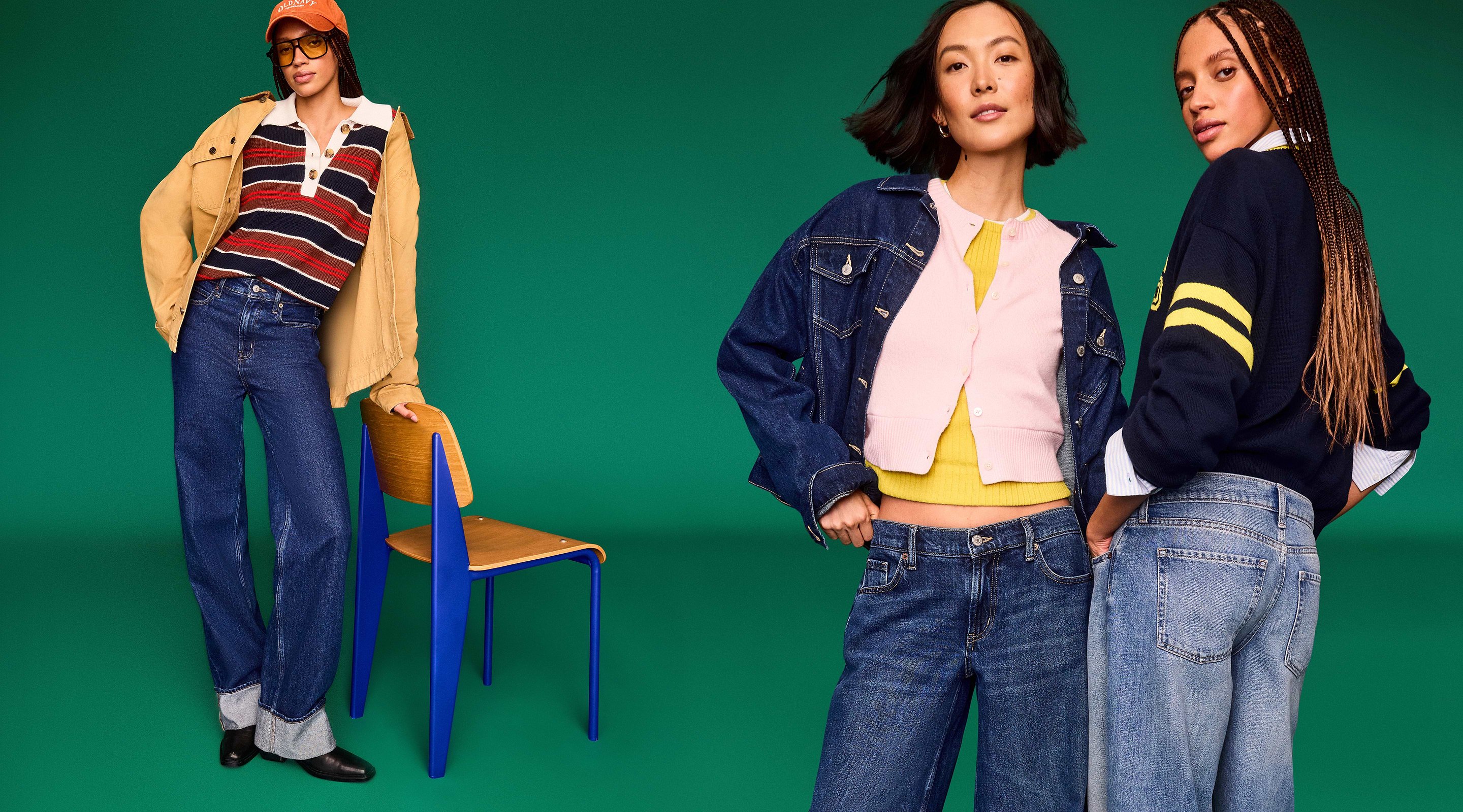 Three people in casual denim outfits pose against a green backdrop; one leans on a wooden chair with blue legs while two stand together in jackets and sweaters.