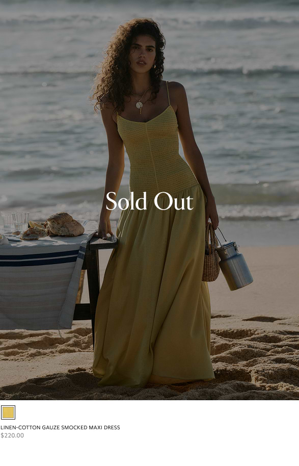 Model at the beach wearing a yellow smocked maxi dress, with “Sold Out” text overlay.
