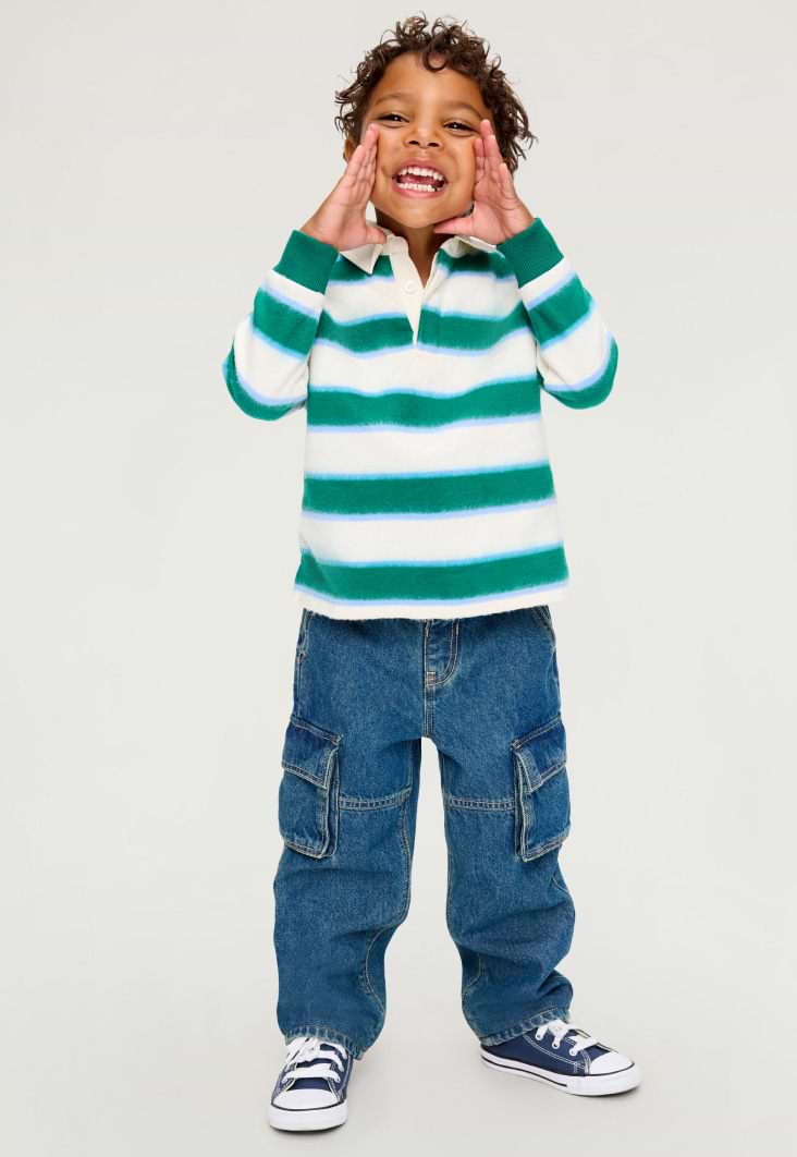 Image of a toddler boy model wearing Old Navy super baggy fit jeans.