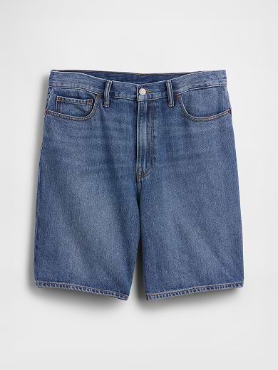 Medium-wash blue denim shorts with five-pocket design, laid flat on a light background.