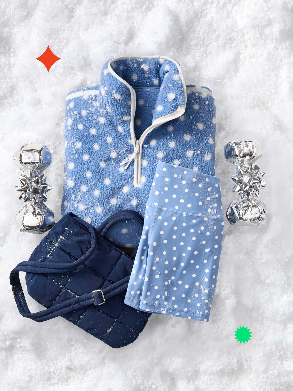 a blue and white polka dot pajama set with a purse and gloves