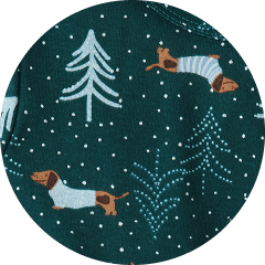 Dark green winter pattern with dachshunds in sweaters, scattered snow dots, and stylized pine trees.