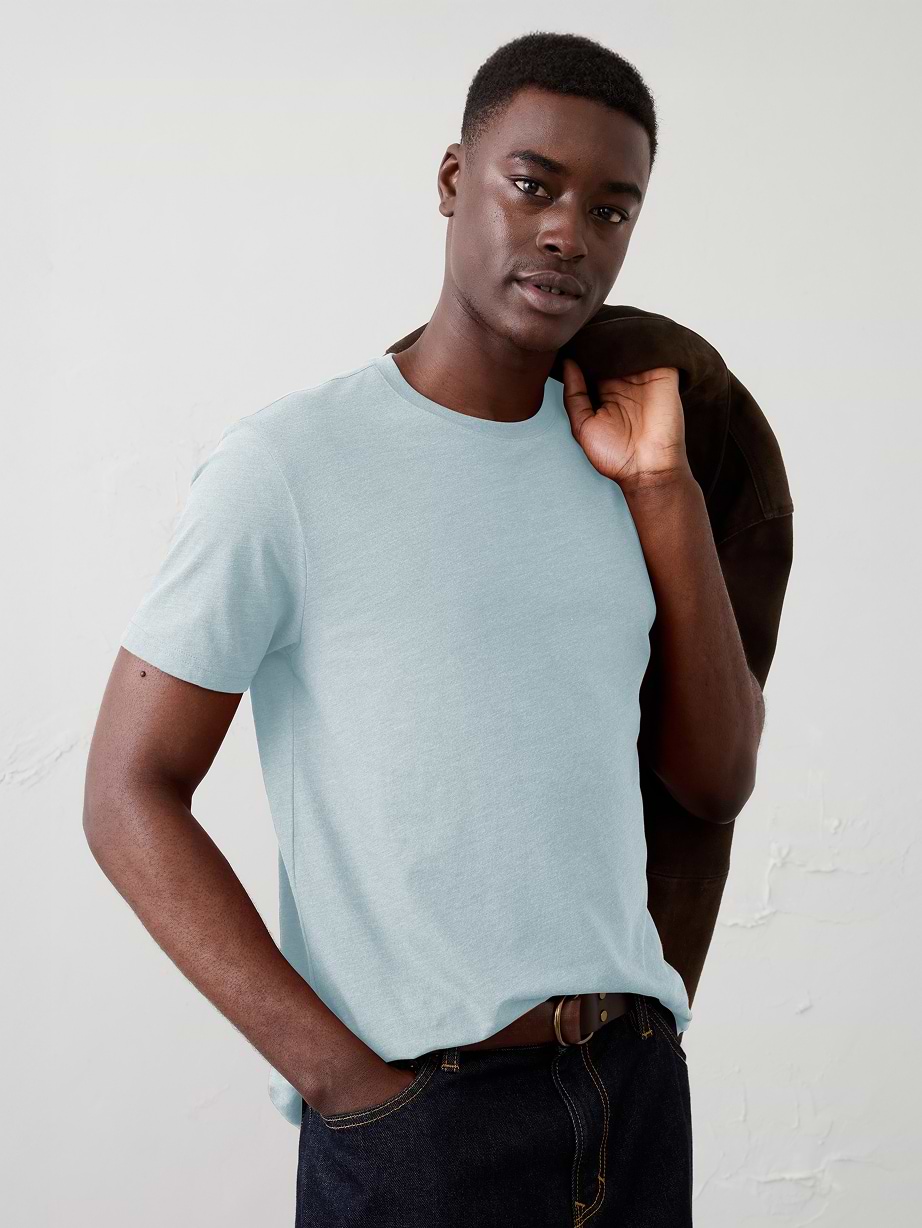 Man in blue t-shirt and jeans.