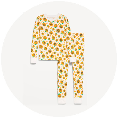 White long-sleeve pajama set with matching pants, white cuffs, and a colorful cookie pattern on a white background.