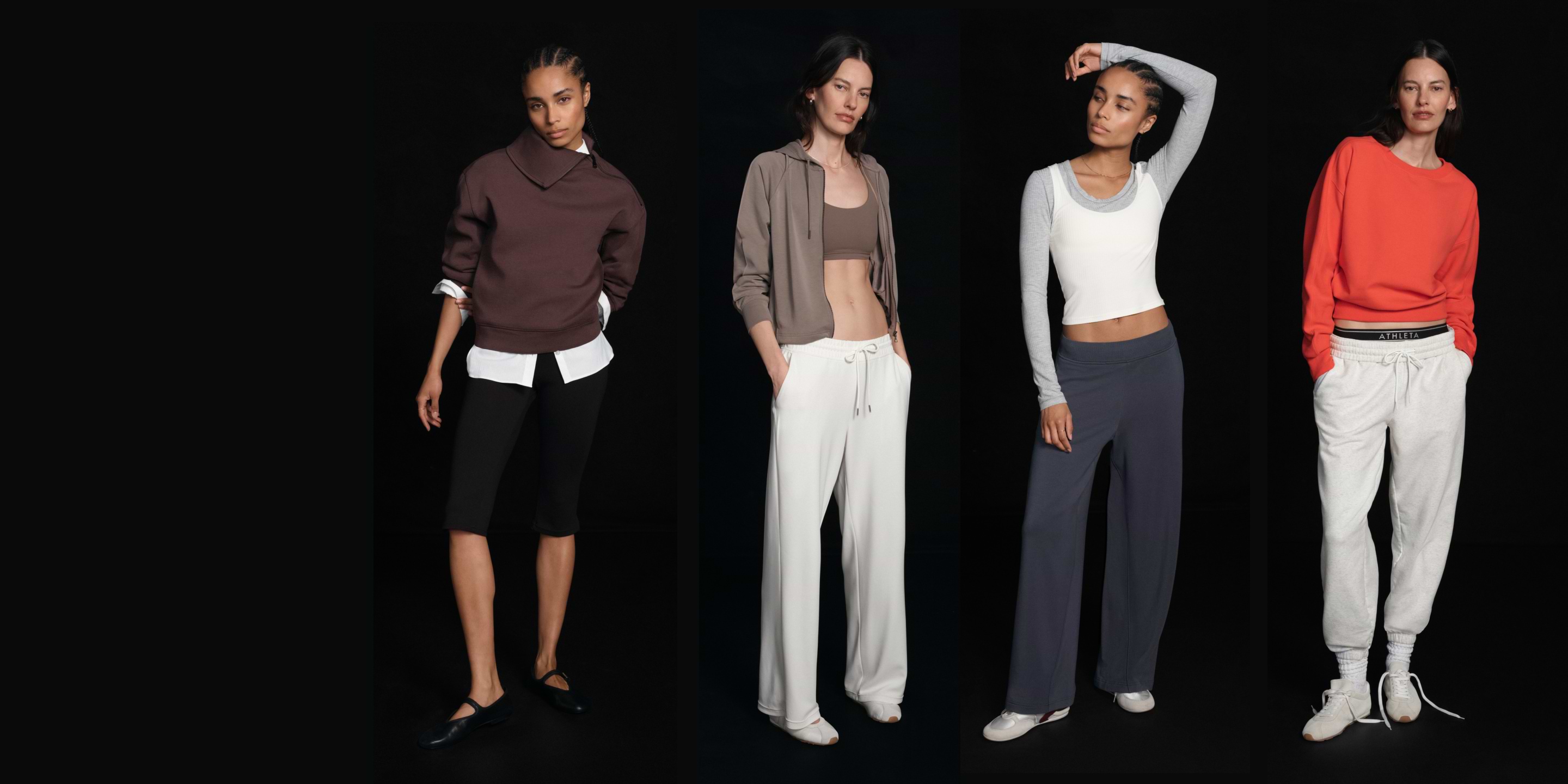 Four models against a black background wear athleisure outfits: layered sweatshirt with knee-length shorts, hoodie with wide white pants, long-sleeve-and-crop top with navy pants, and red sweatshirt with gray joggers.