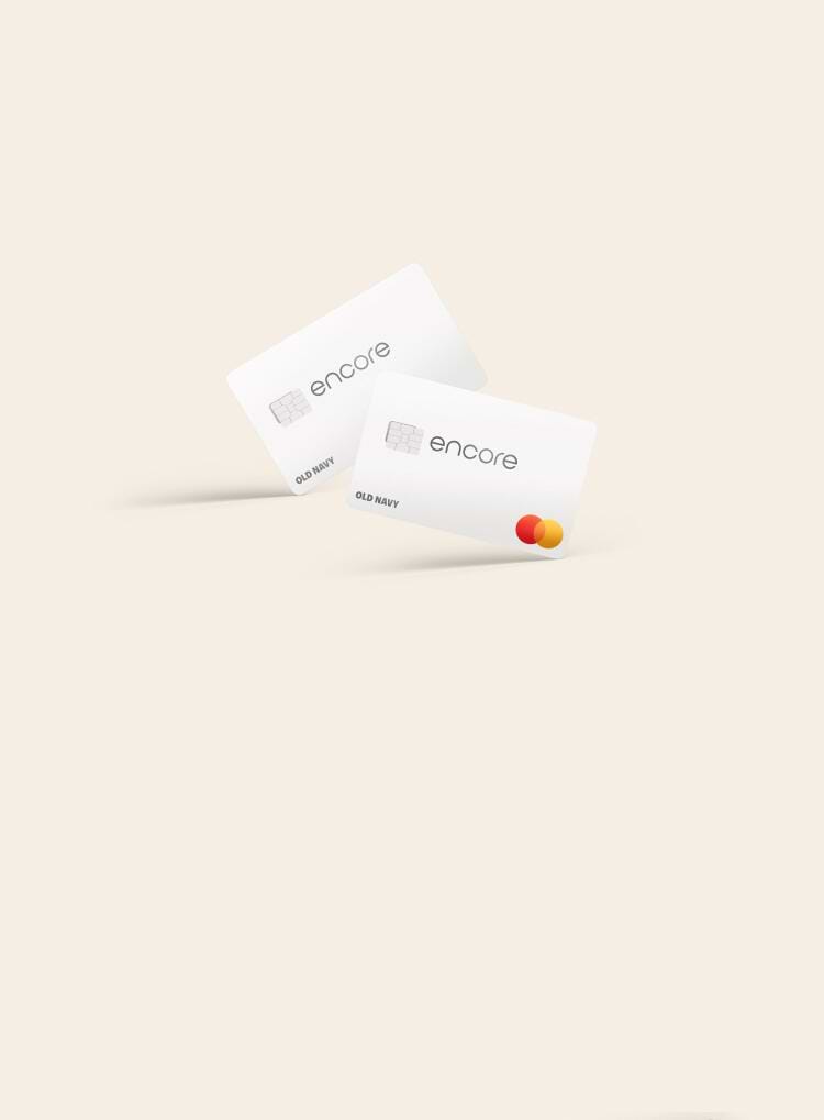 a pair of white encore credit cards featuring a mastercard logo of two orange circles overlapping