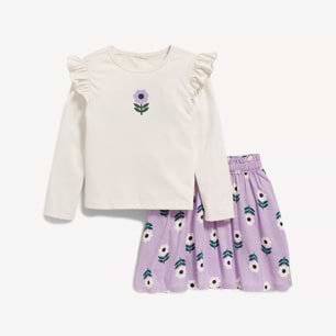 Cream long‑sleeve ruffle top with small purple flower, paired with a lavender skirt featuring matching floral print.