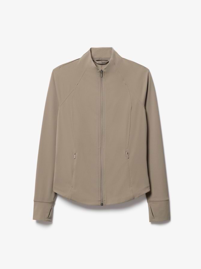 Beige zip-front jacket with stand collar, long sleeves, zip pockets, and cuff slits.