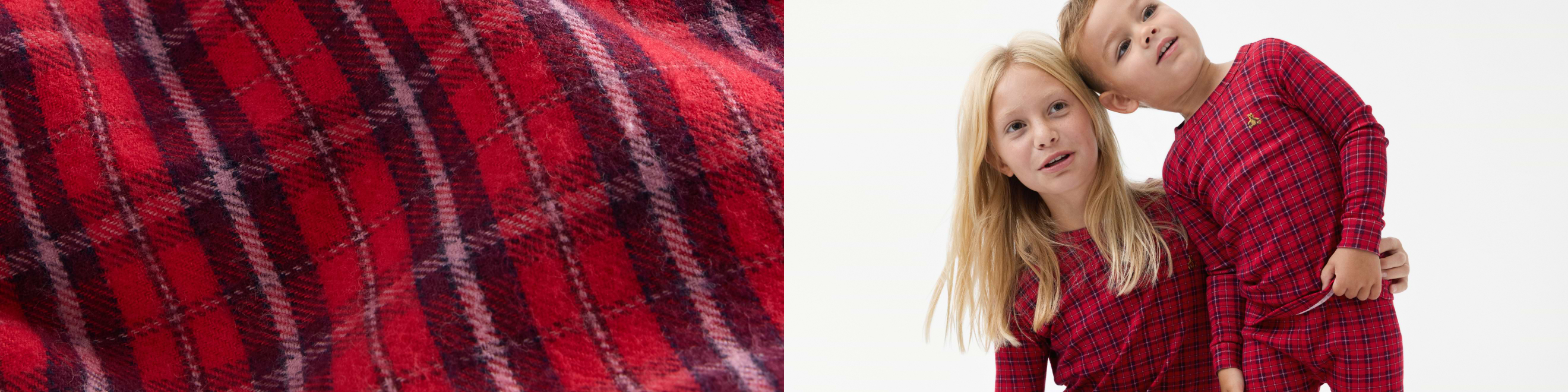 Close-up of red plaid fabric beside two children wearing matching red plaid long-sleeve pajamas on a white background.