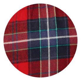 Close-up of red tartan plaid fabric with navy and black squares and white, green, and yellow stripes.