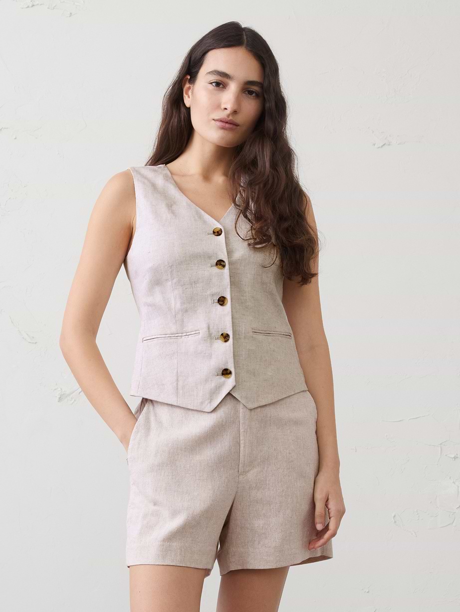 Woman in linen matching set.