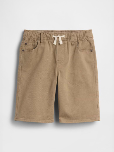 Tan pull-on shorts with elastic waistband, white drawstring, and front pockets on white background.