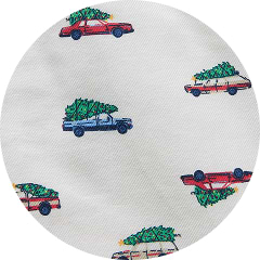 Repeating pattern of cars with Christmas trees on their roofs on white fabric.