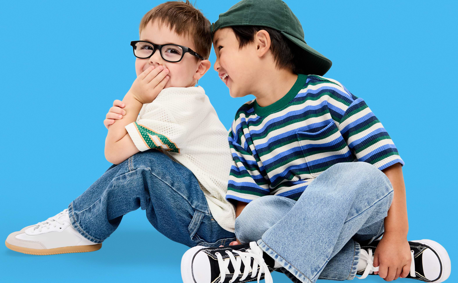 Image of two toddler boys wearing Old Navy jeans and t-shirt.