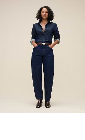 Barrel Leg. A distinctive curved fit that tapers towards the ankle.