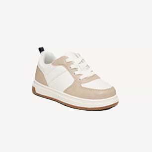 Beige and white low-top sneaker with white laces and a brown rubber sole.