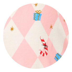 Red fabric with white holiday motifs: a rocking horse, snowflake, and ornament.