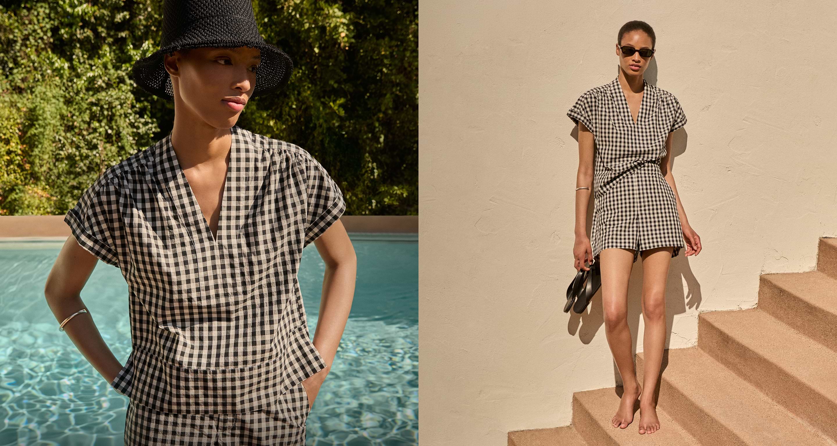 Woman in plaid top and matching shorts with black hat and sunglasses.