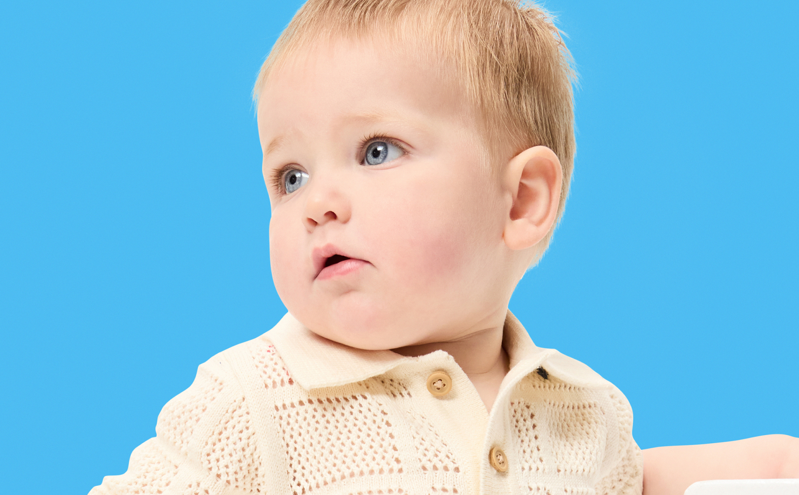 Image of a baby wearing an Old Navy t-shirt.
