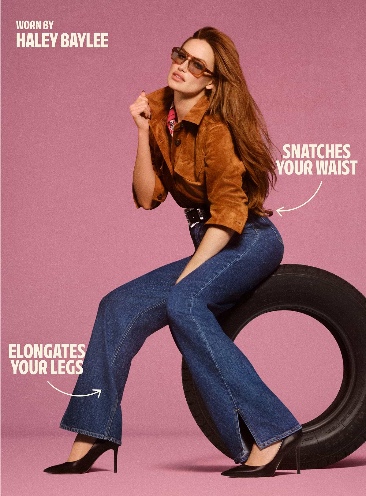 Model in sunglasses wearing a brown suede jacket, high‑waisted flared blue jeans, and black heels sits on a tire against a pink background; arrows note the jeans “snatch your waist” and “elongate your legs.”