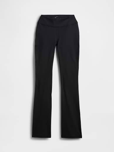 a women's black pants with a zipper on the side