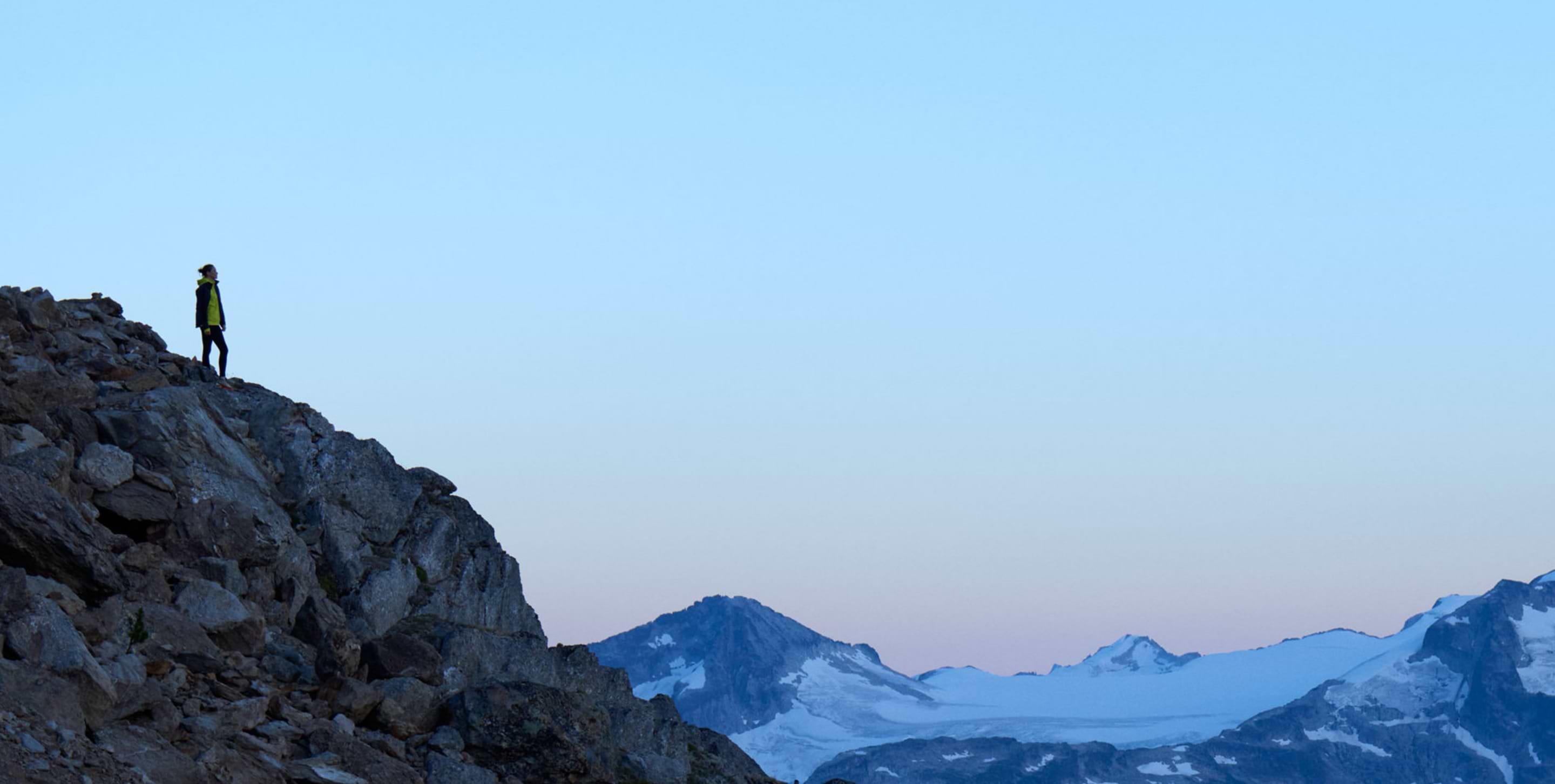 Woman climbing a mountain
