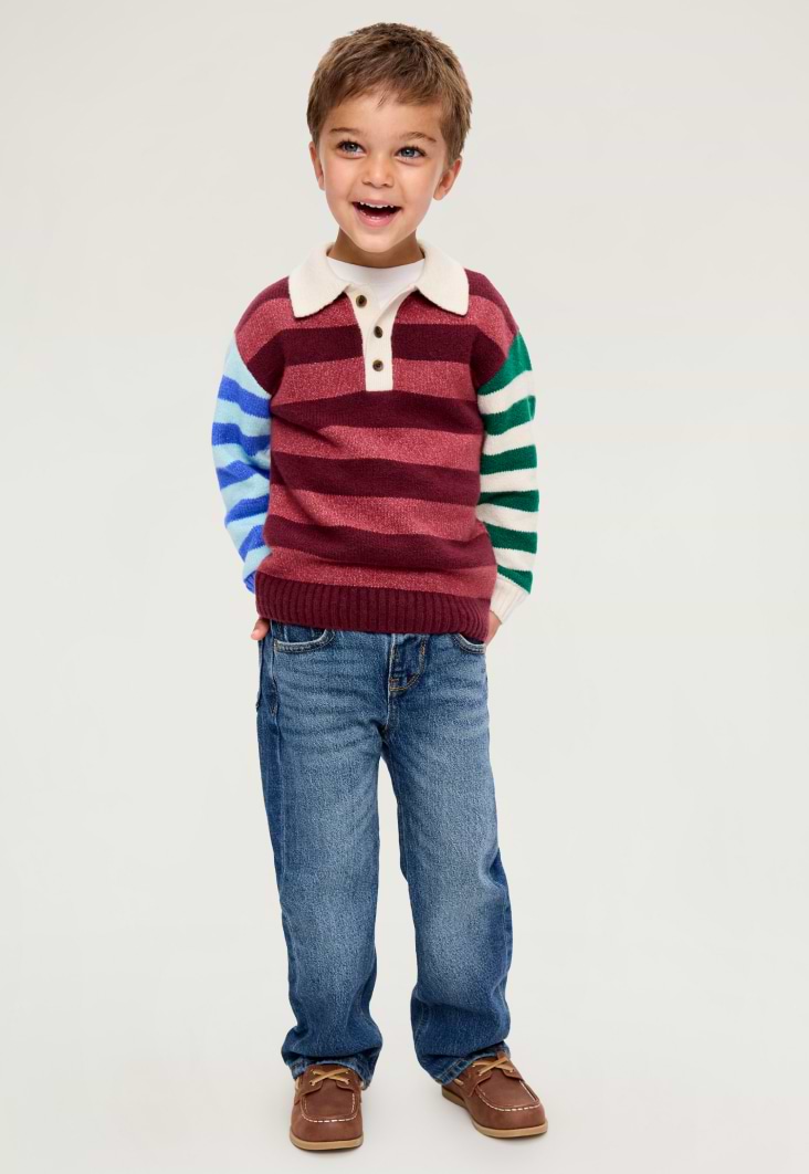Image of a toddler boy model wearing Old Navy oversized fit jeans.