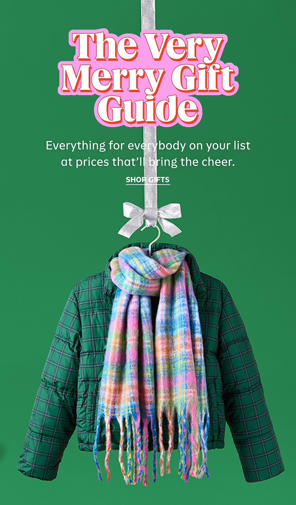 Holiday gift guide poster with a green plaid puffer jacket and a colorful scarf hanging from a silver ribbon; text reads “The Very Merry Gift Guide.”