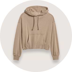 Beige cropped hoodie with drawstrings and a front kangaroo pocket.