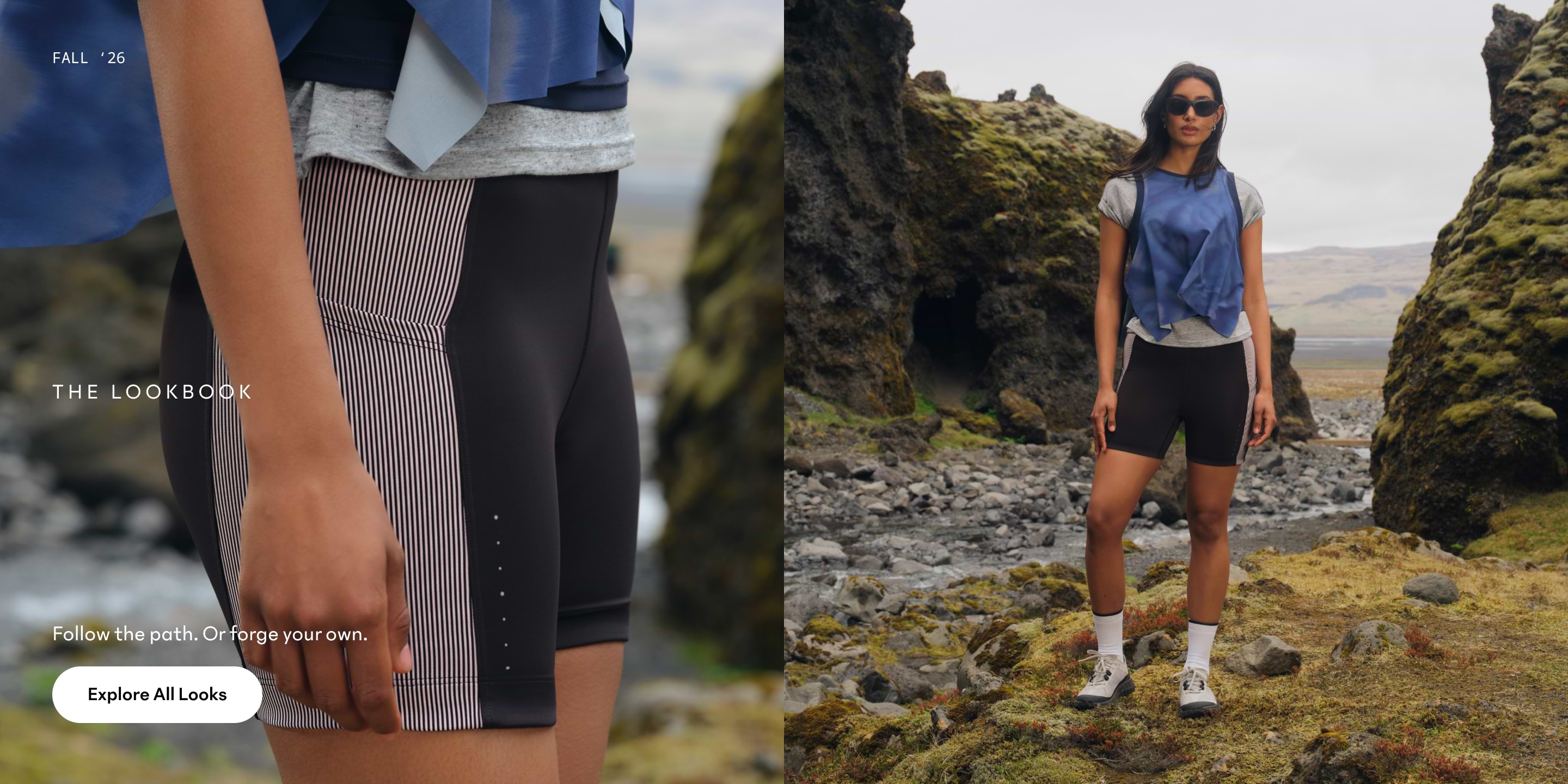 Model in blue vest, gray tee, and black bike shorts stands in a mossy rocky landscape.